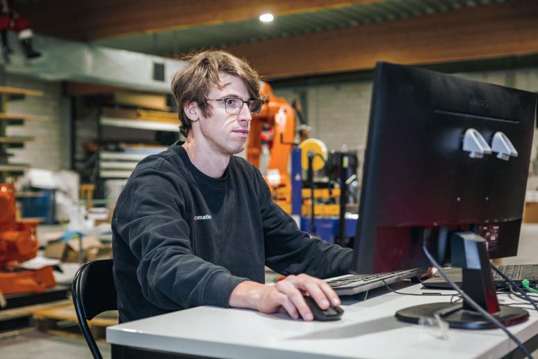 Employee behind computer